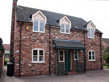 Miss B. : Winsford Cheshire Installation of White wood PvcU Timber look windows. Double glazed . Timber windows cheshire